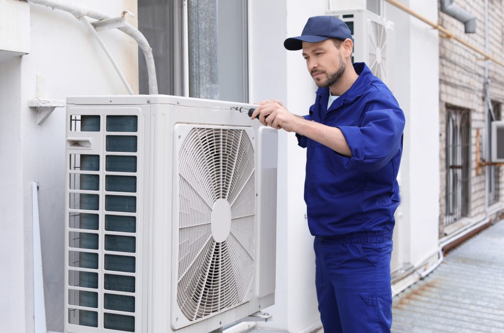 Male,Technician,Repairing,Air,Conditioner,Outdoors